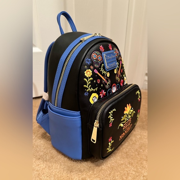 Coco themed Disney Parks Loungefly backpack - Picture 3 of 7